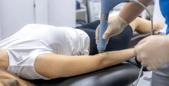 calcific-tendinitis Clinician in Hawaii uses ultrasound imaging to locate calcium deposits on tendons prior to barbotage procedure to treat calcific tendinitis.